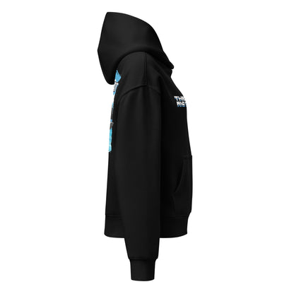 Black women’s relaxed hoodie side/back view; small chest print and sleeve graphic.
