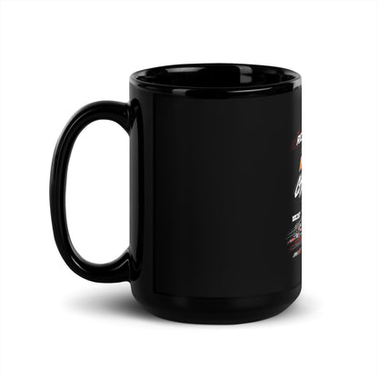 Glossy black mug with curved handle; small side logos and racing stripes