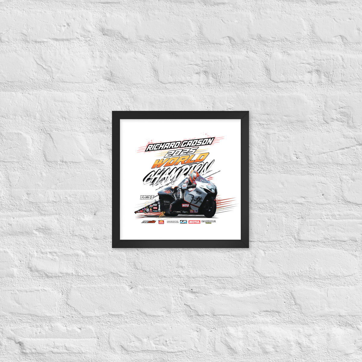 Small framed racing poster with black border showing race car graphic and “World Champion” style text