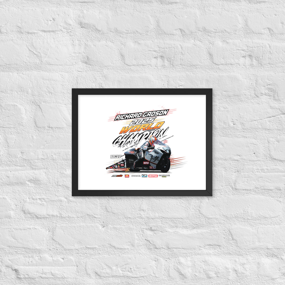 Framed racing poster with black border showing a motorcycle and race car graphic with bold title