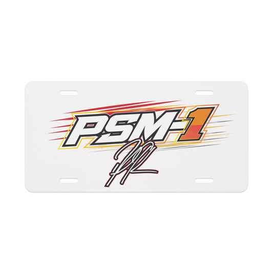 White vanity license plate with colorful racing logo and signature; four mounting holes